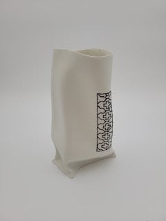 White porcelain vase with black slip work