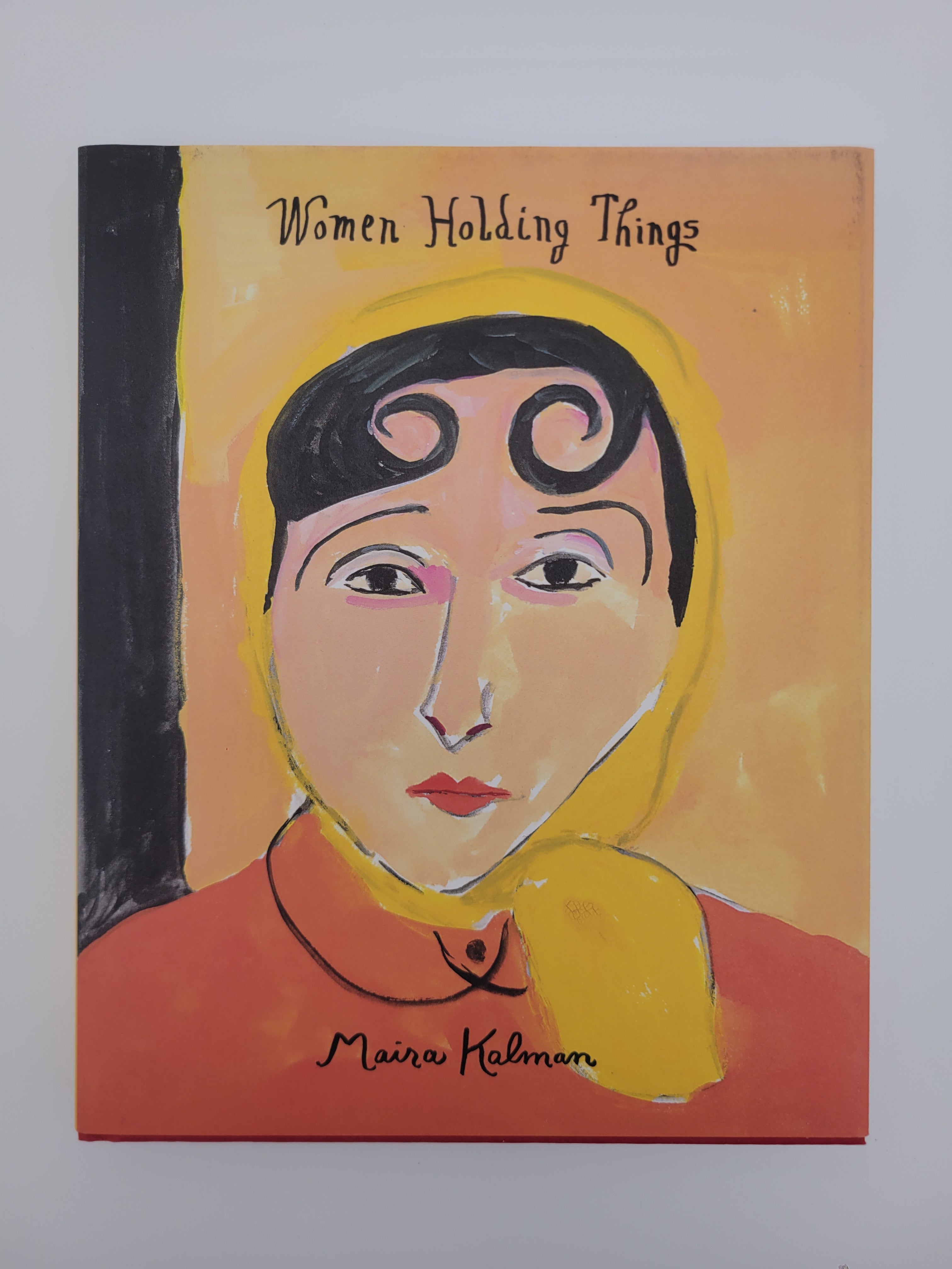 Women Holding Things - book