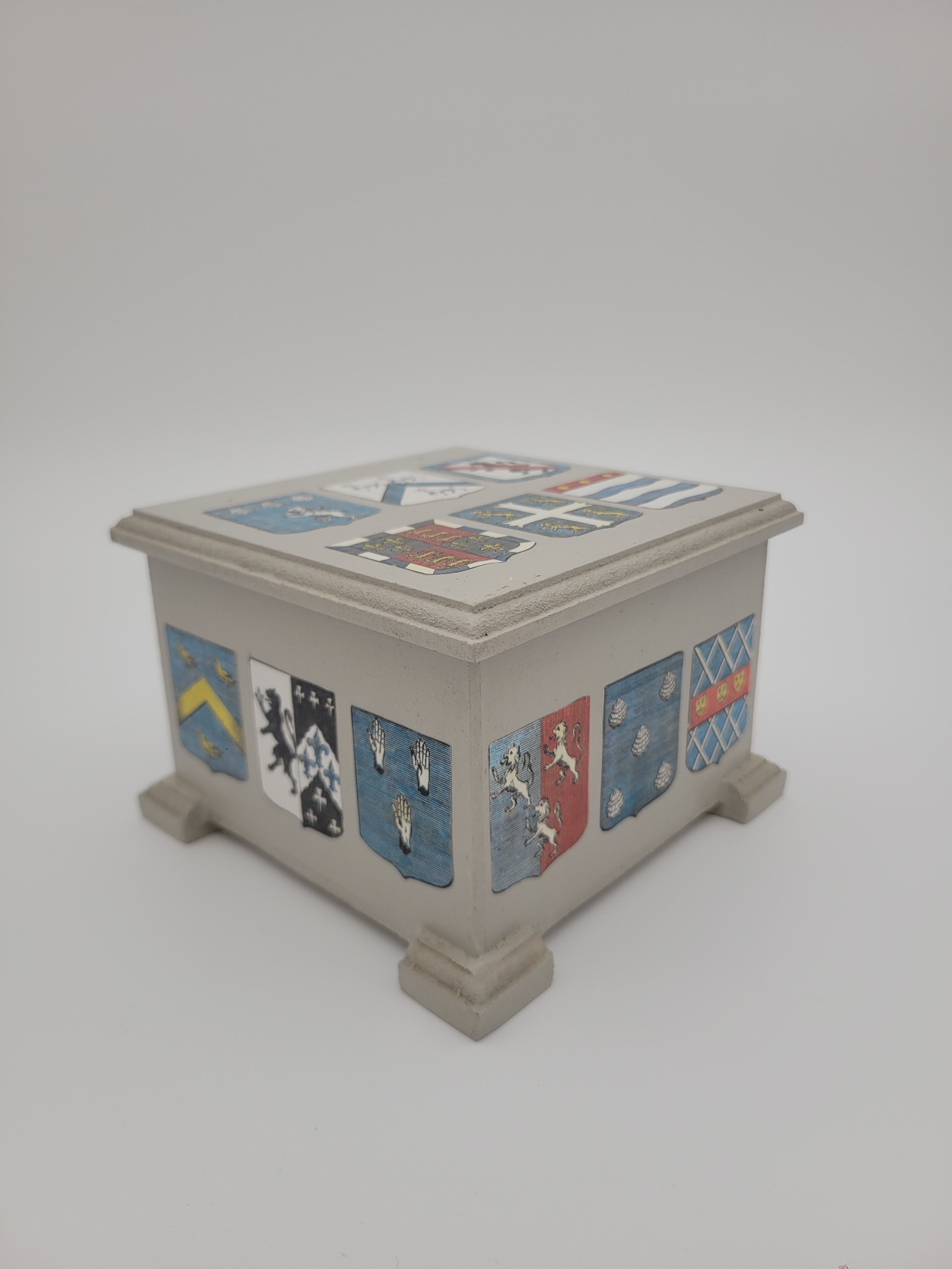 Decoupage box decorated with crests