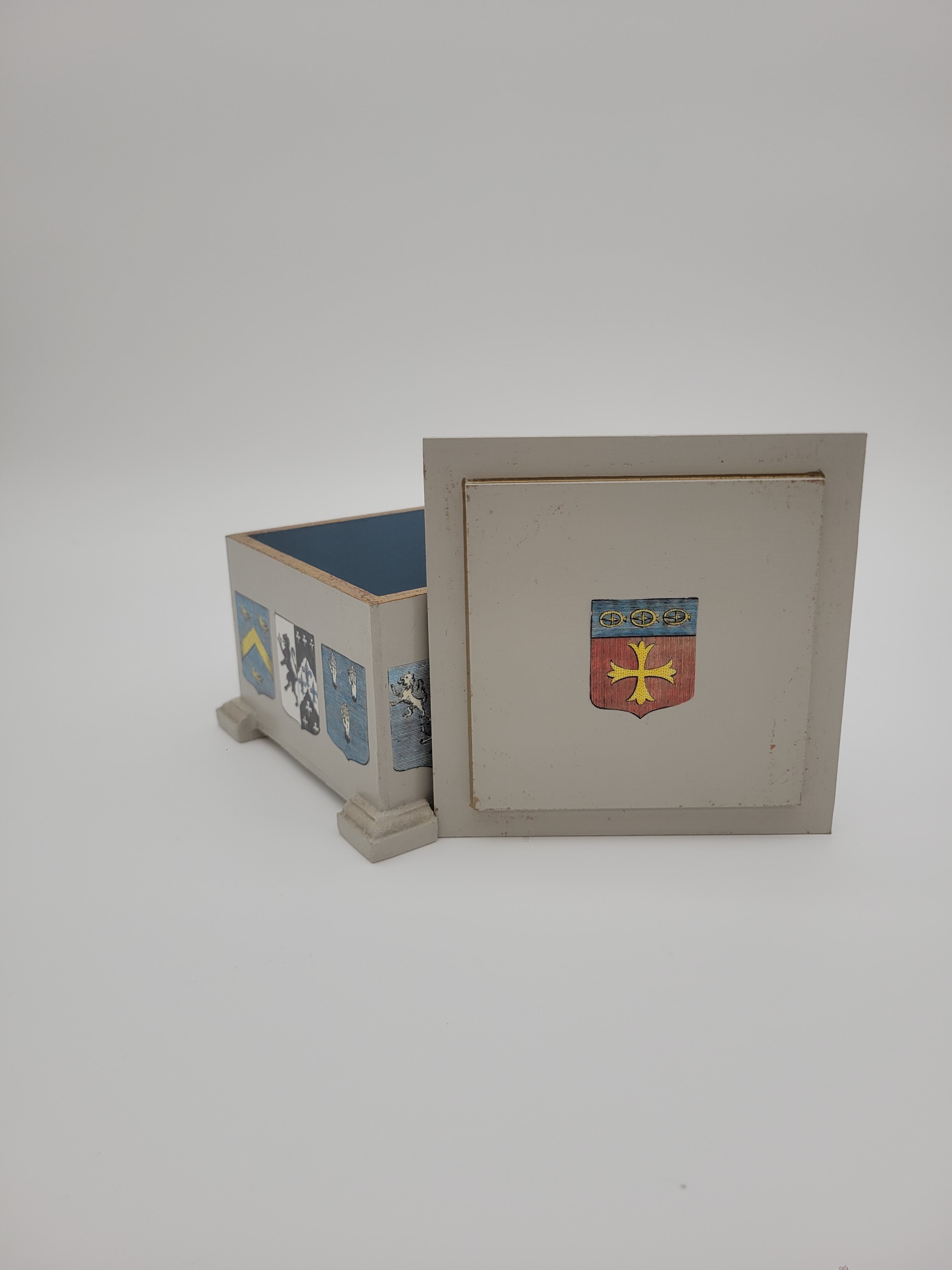 Decoupage box decorated with crests