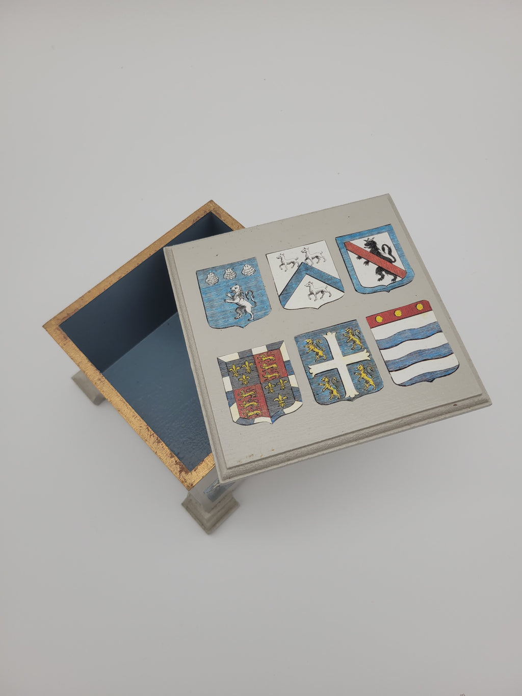 Decoupage box decorated with crests
