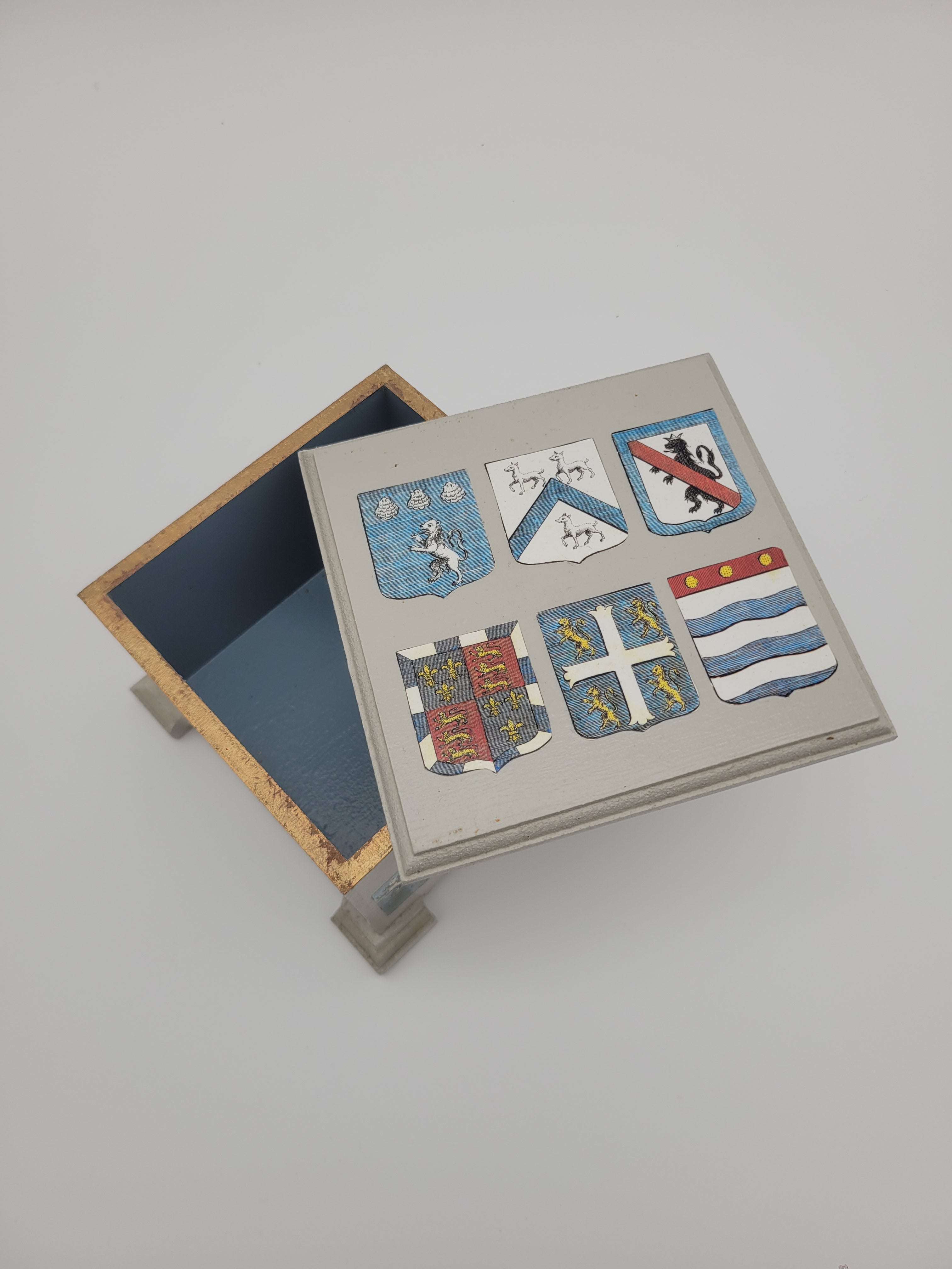 Decoupage box decorated with crests