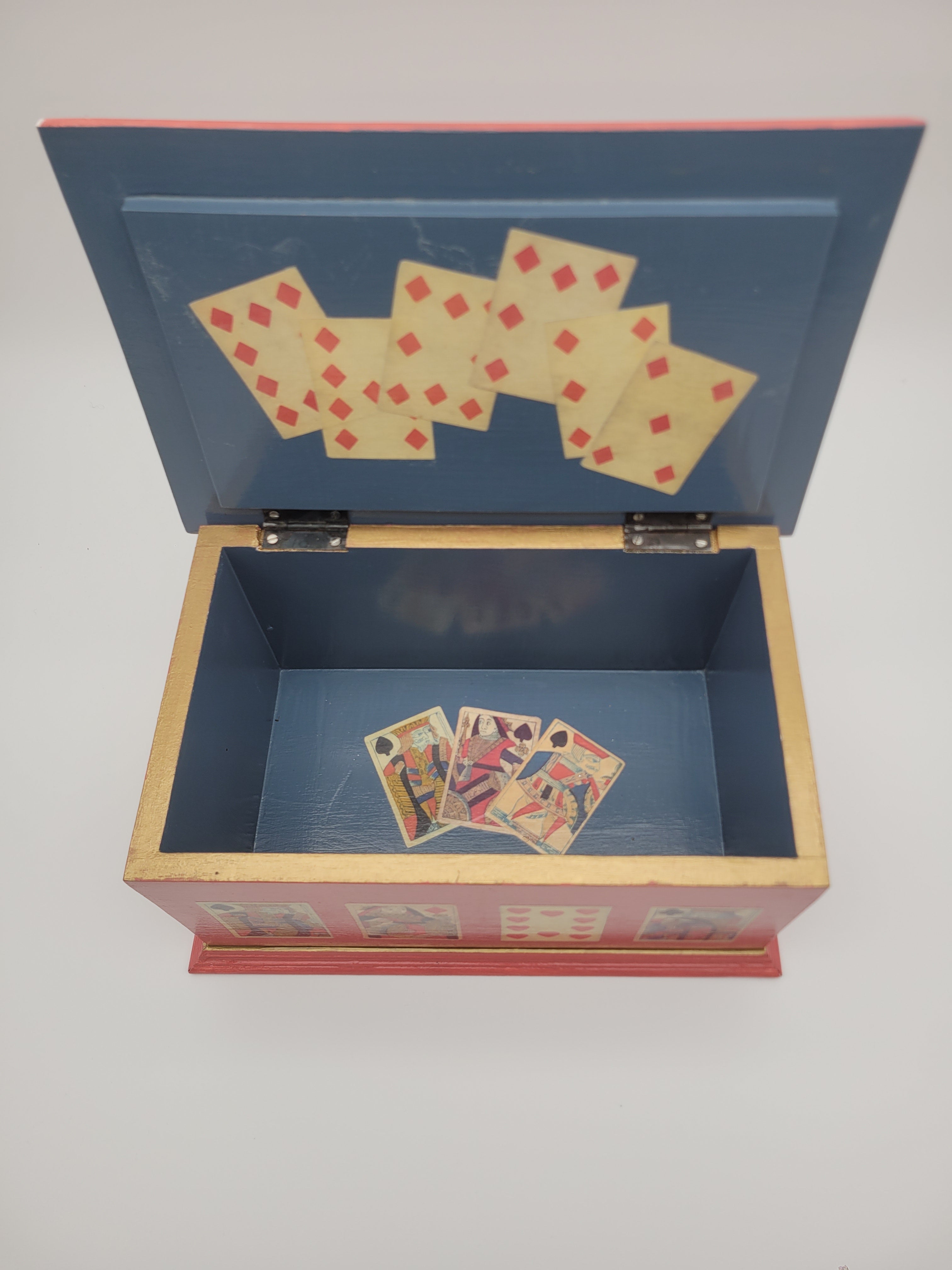 Decoupage chest with playing card design
