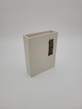 White ceramic rectangular vase with filigree detail
