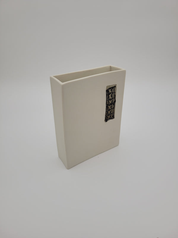 White ceramic rectangular vase with filigree detail