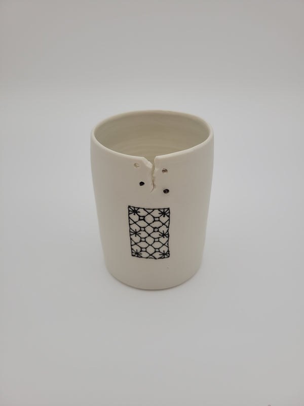 White ceramic vase - short - with filigree detail and decorative opening at rim
