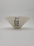 White ceramic bowl, medium size, with filigree detail and decorative opening at rim