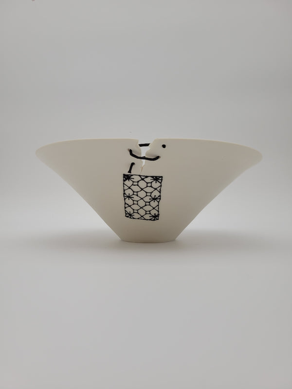 White ceramic bowl, medium size, with filigree detail and decorative opening at rim