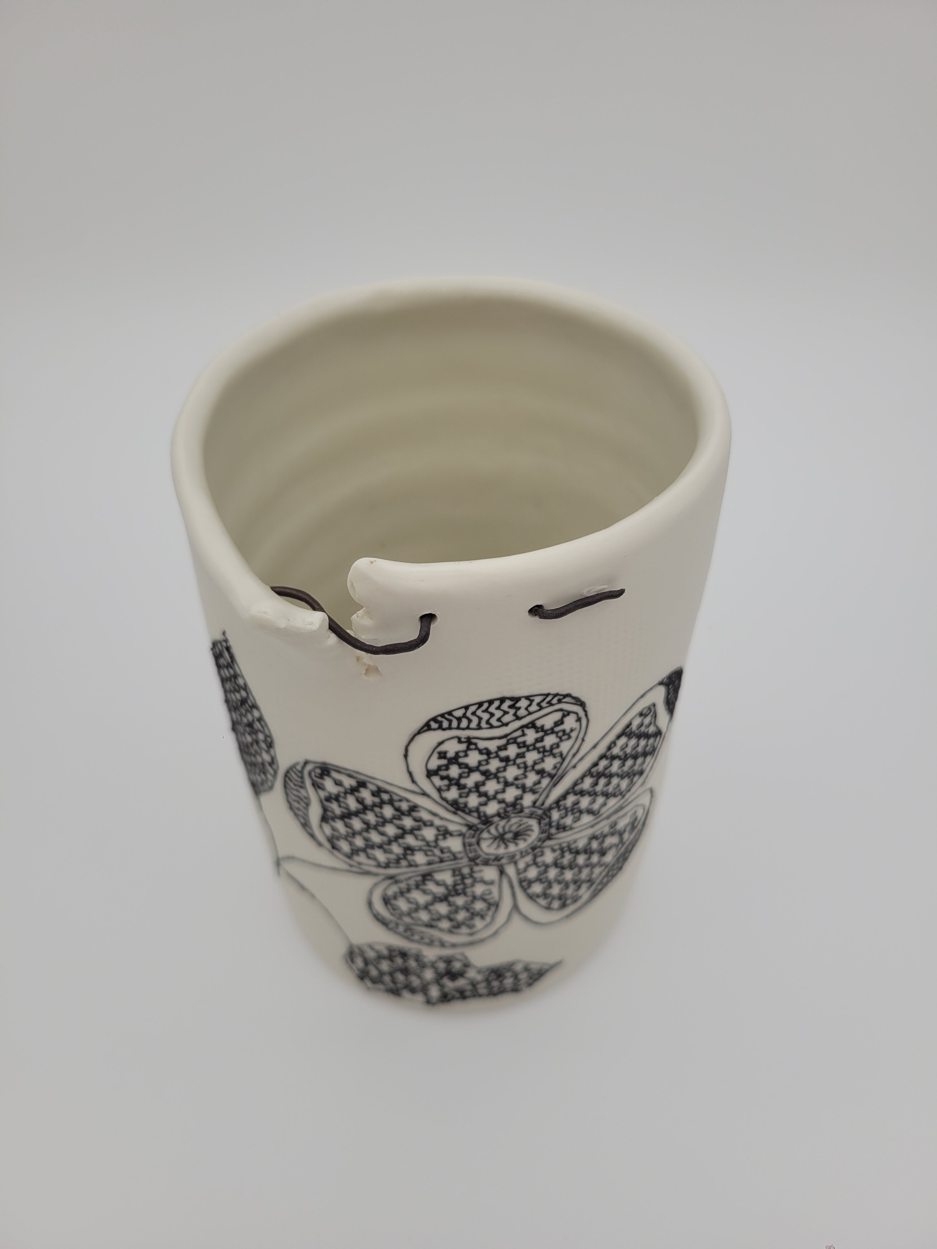 White ceramic vase - tall - with filigree detail