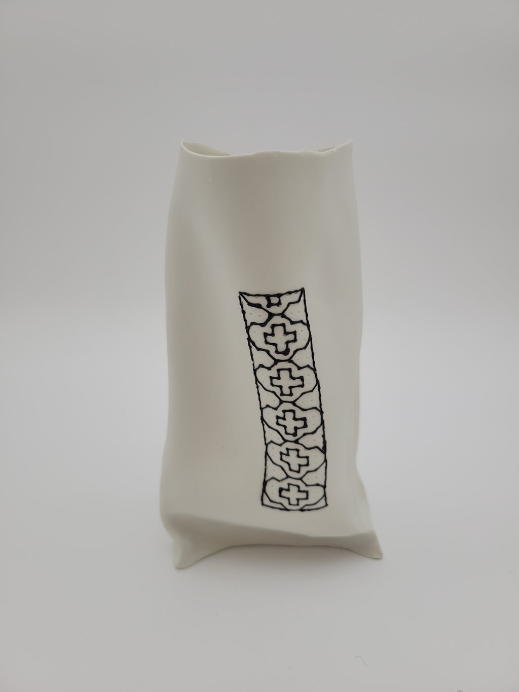 White porcelain vase with black slip work