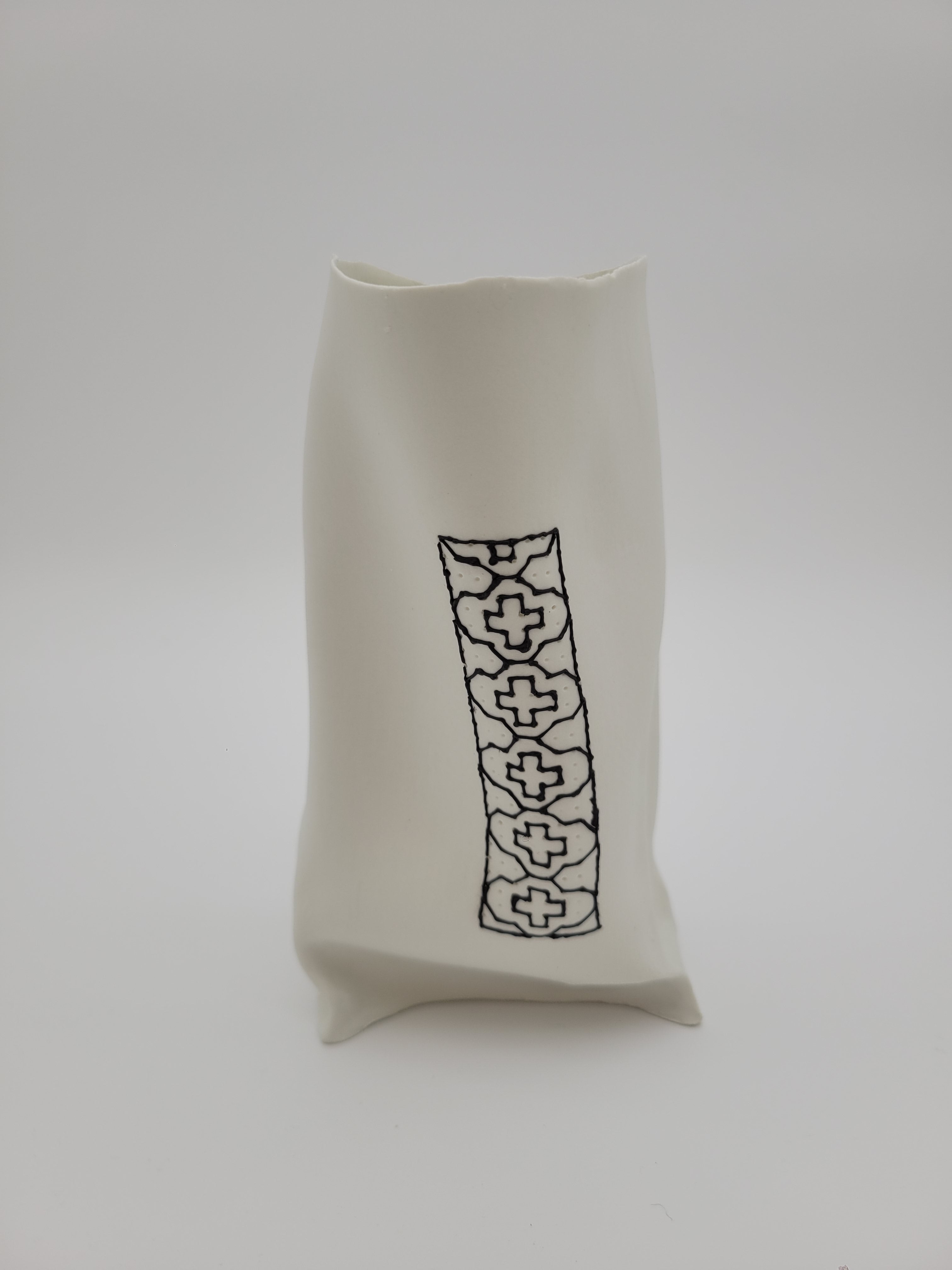 White porcelain vase with black slip work