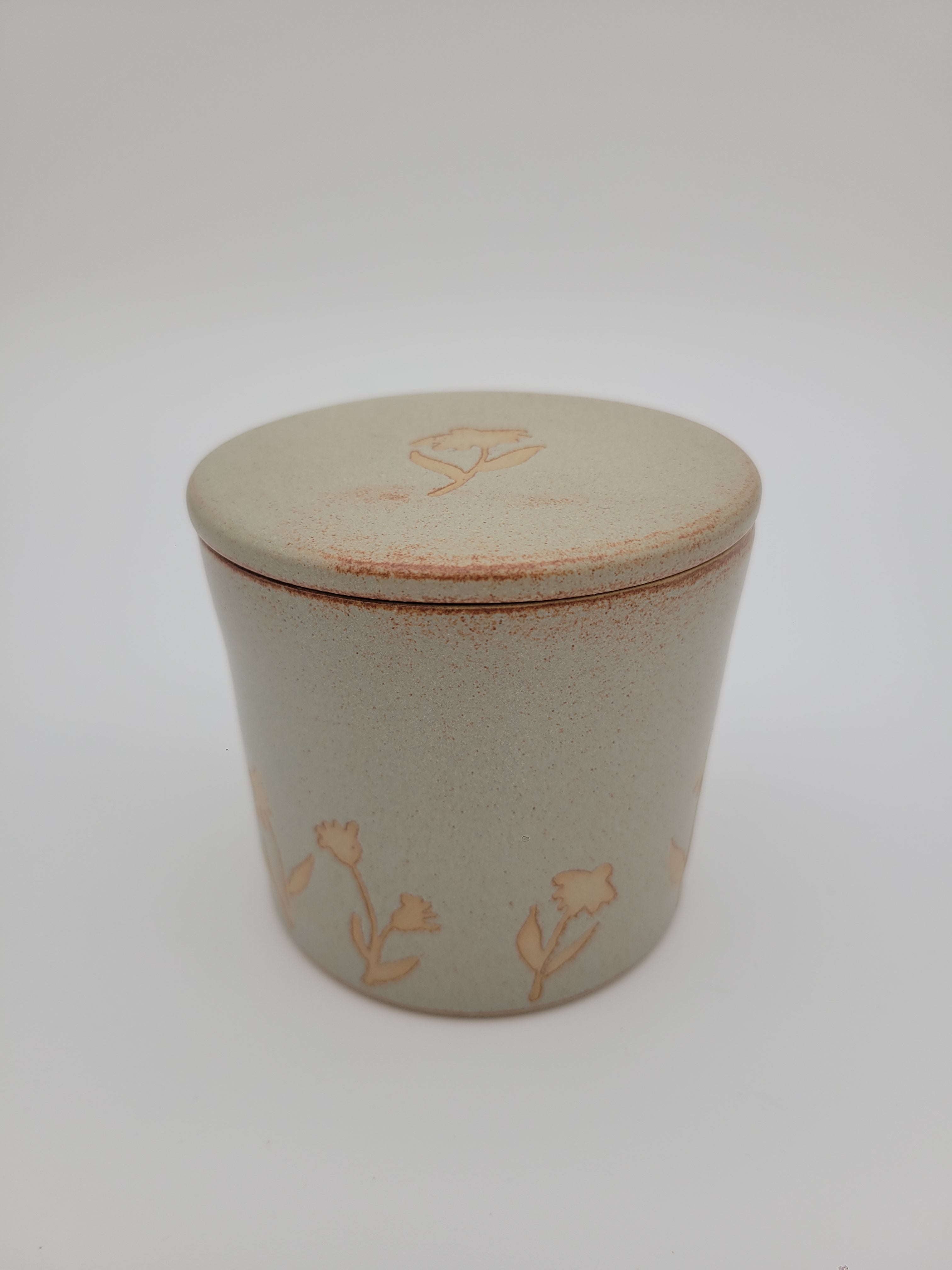 Butter crock, beige glaze with floral details at base
