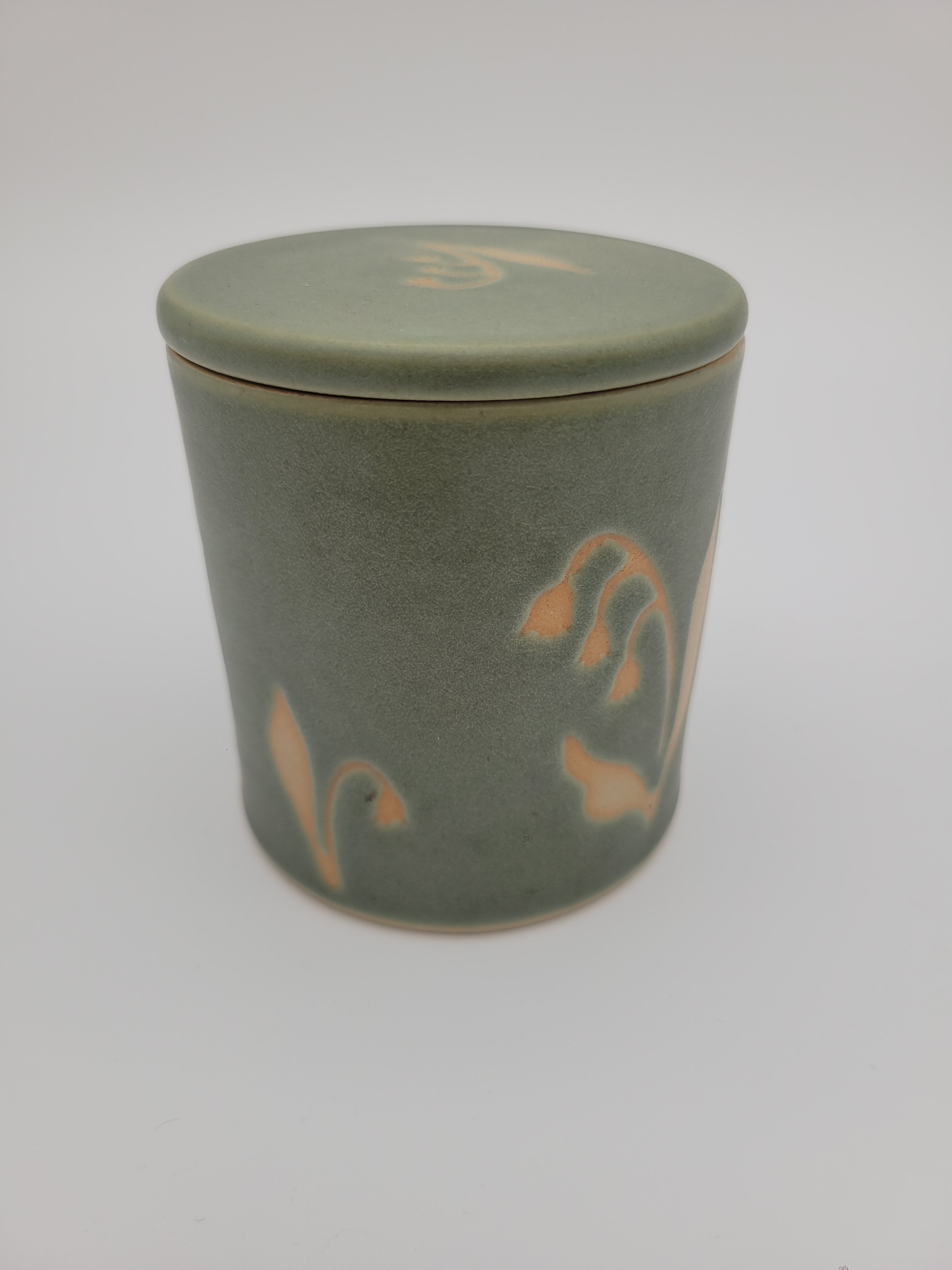 Butter crock, green glaze with floral detail