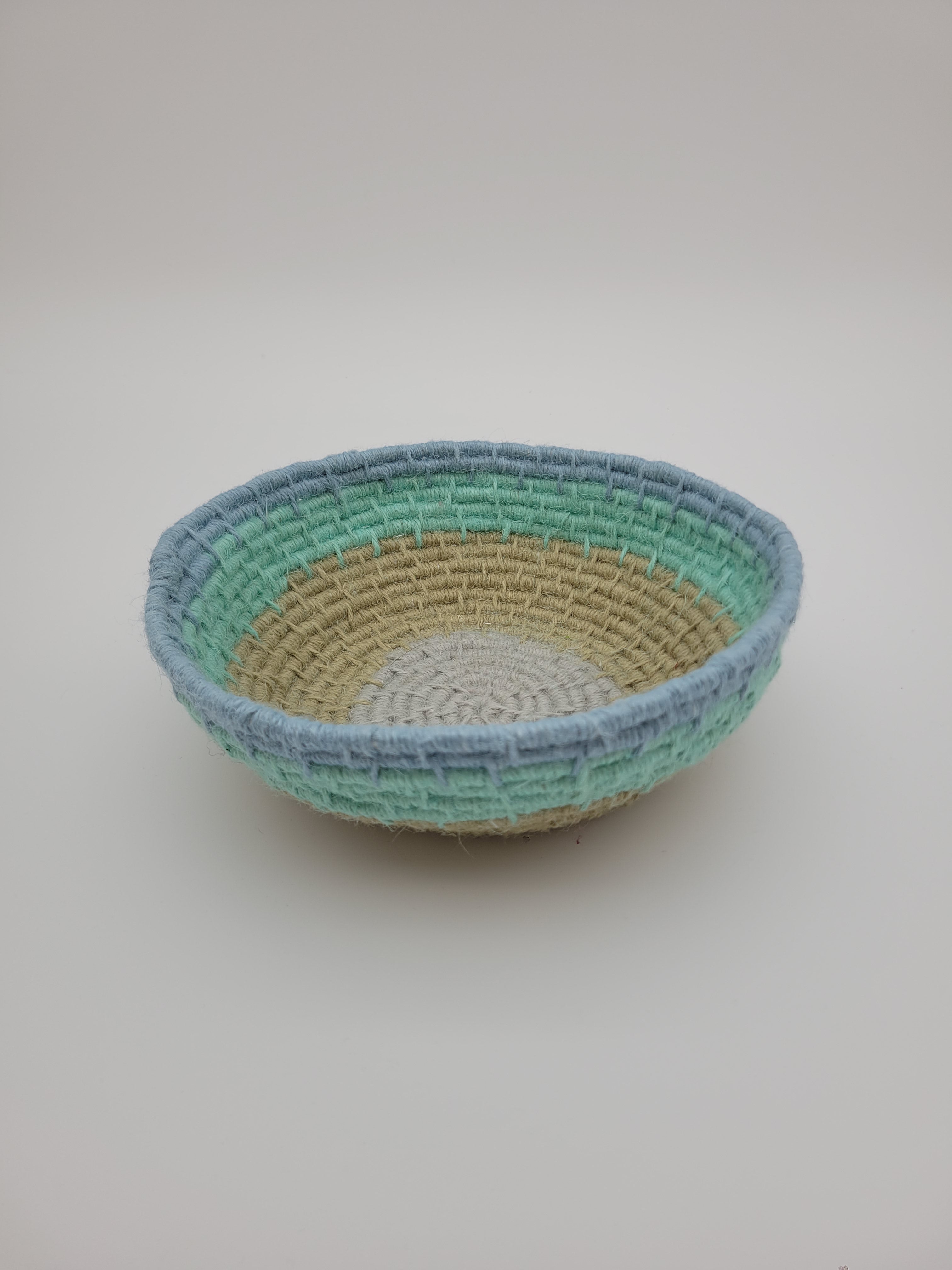 Handmade coiled yarn bowl in natural and sea foam colours