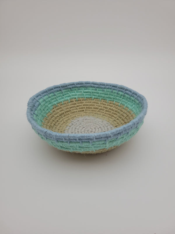 Handmade coiled yarn bowl in natural and sea foam colours