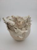 Tall handmade ceramic vase with frilled construction