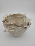Hand crafted ceramic vase with frilled construction
