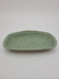 Trinket dish, pale green, with embossed open floral design