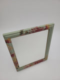Mirror with decoupage surround