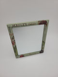Mirror with decoupage surround