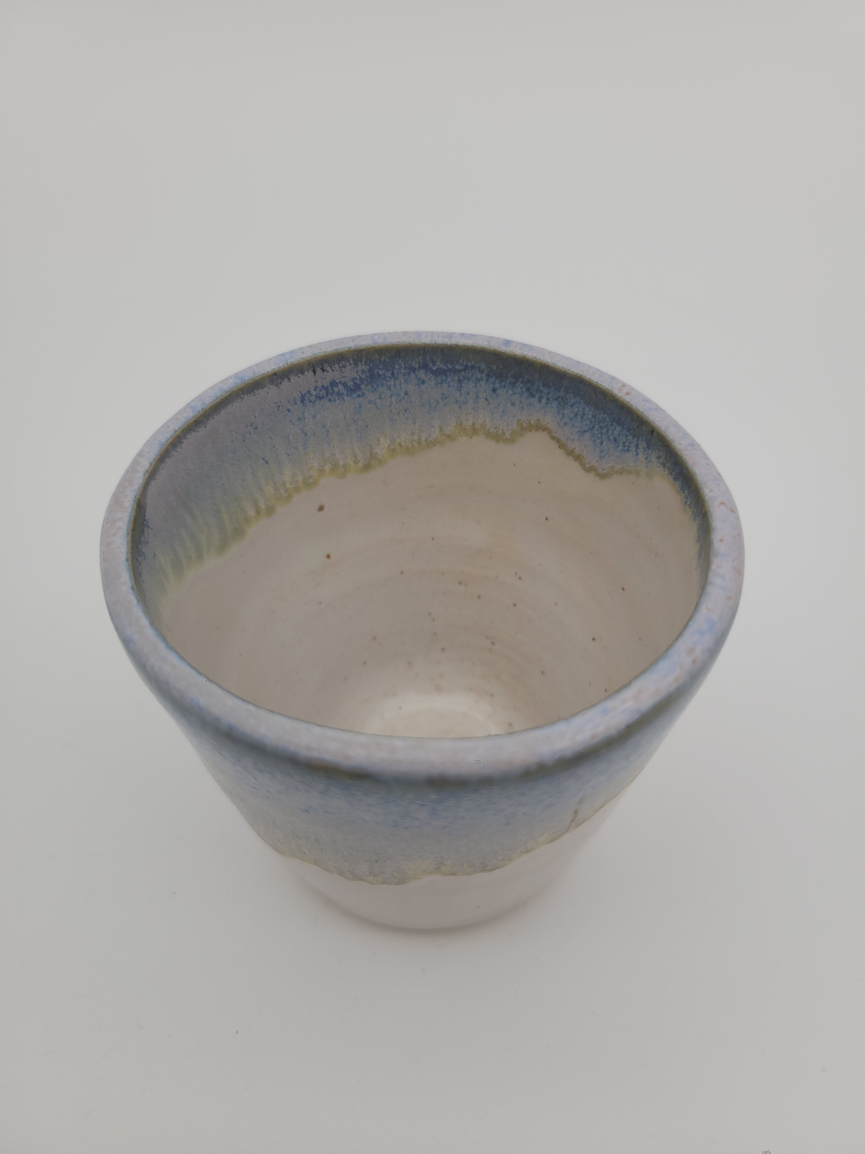 Small bowl with blue glaze detail