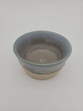 Small bowl with blue / brown glaze detail