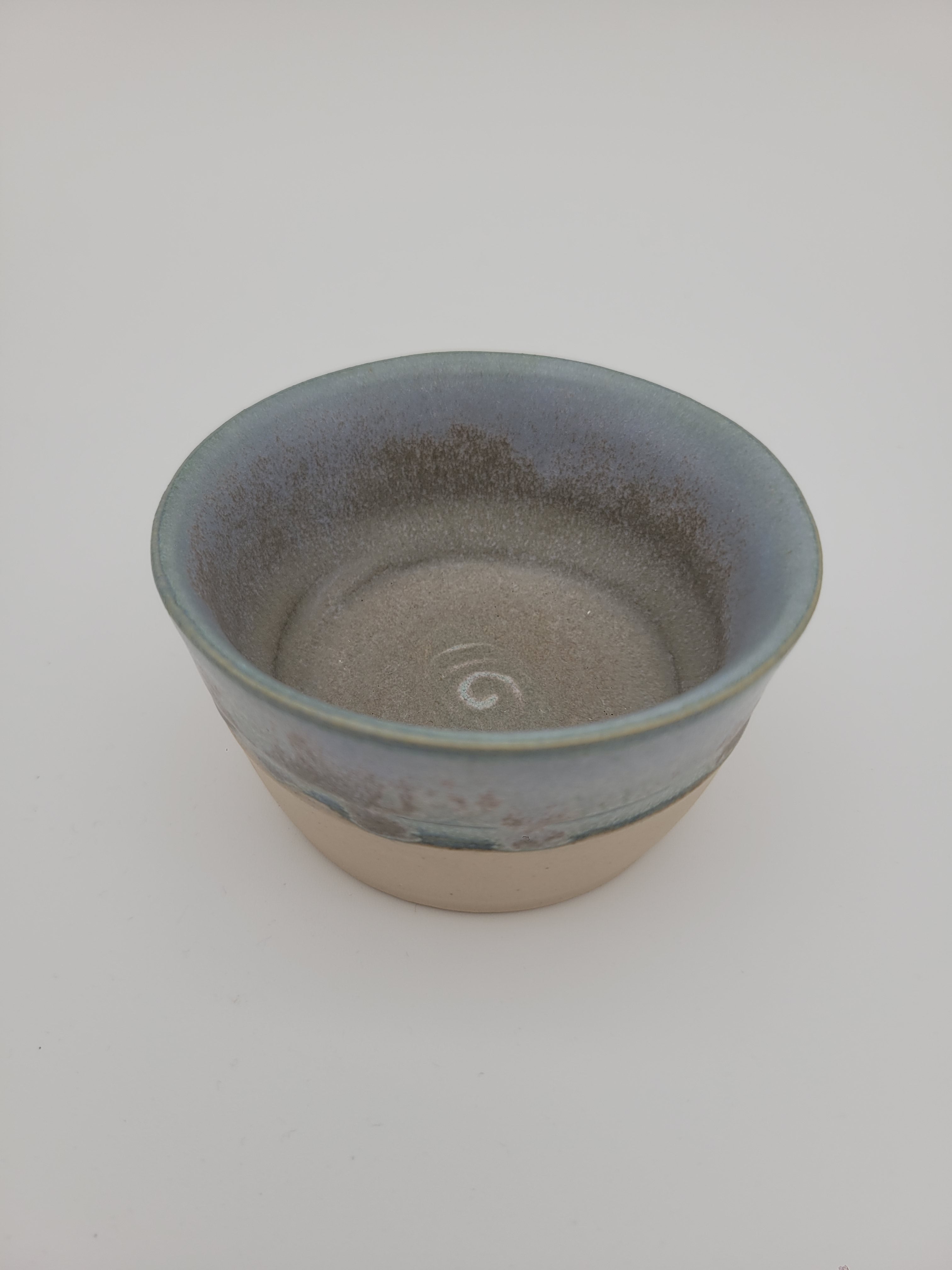 Small bowl with blue / brown glaze detail