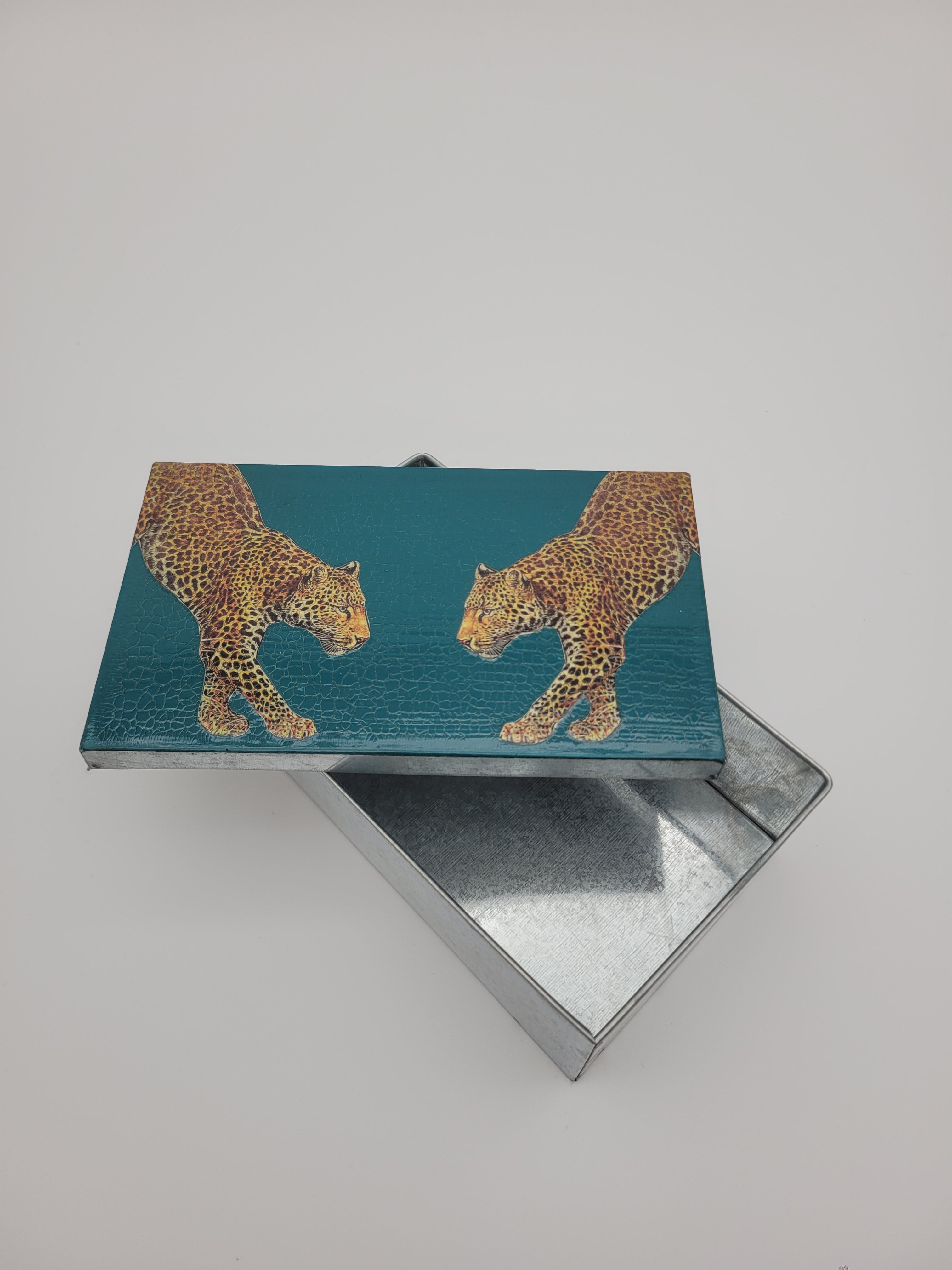 Decoupage tin with two leopards