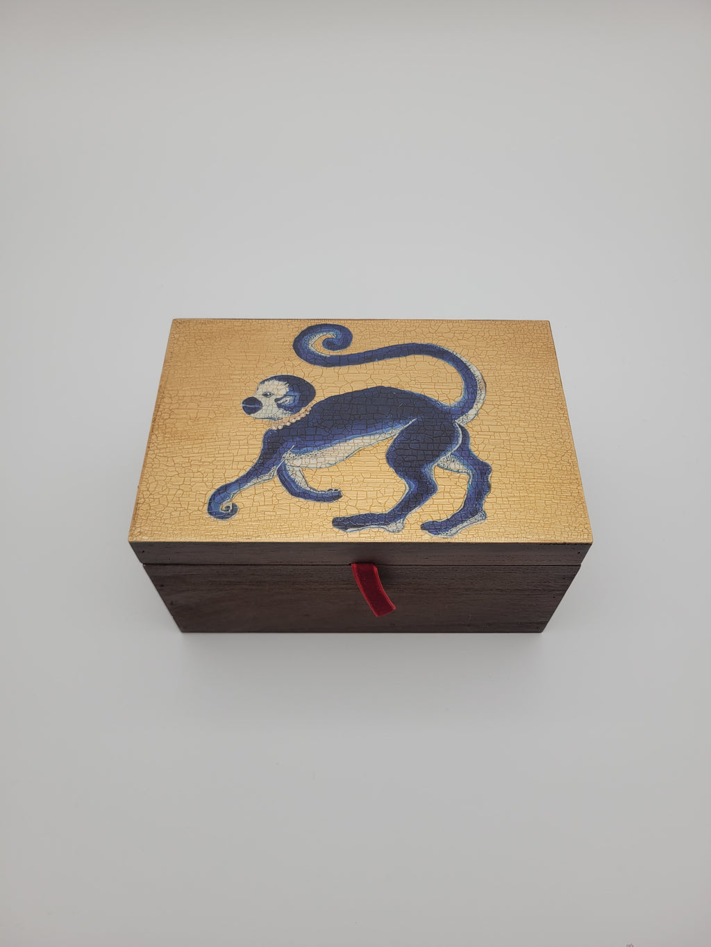 Decoupage box with monkey on gold