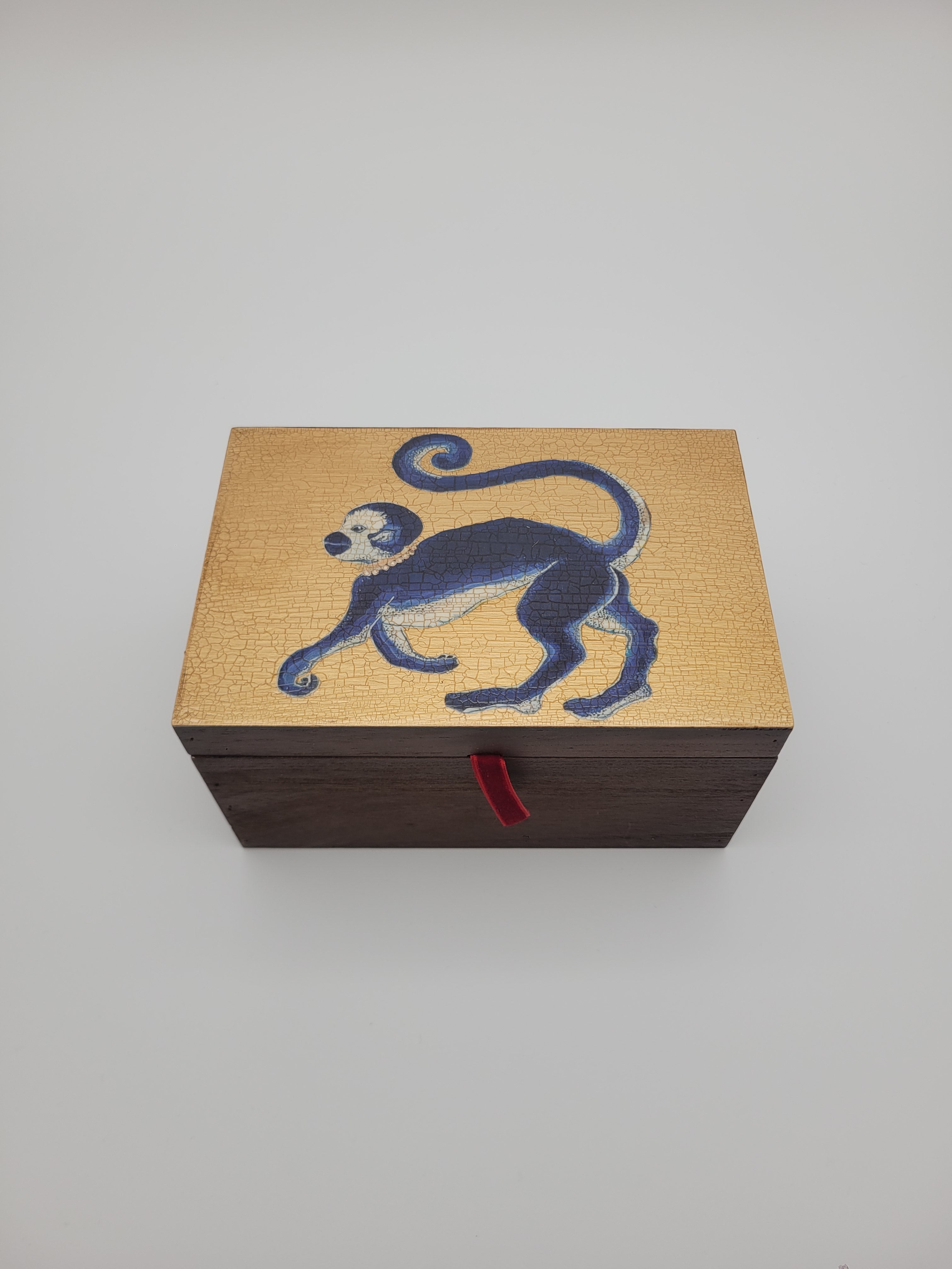 Decoupage box with monkey on gold