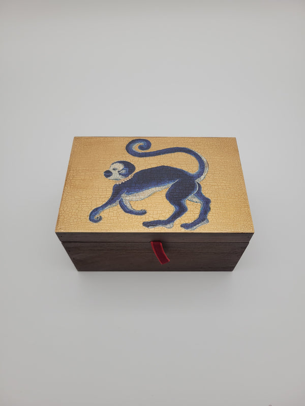 Decoupage box with monkey on gold