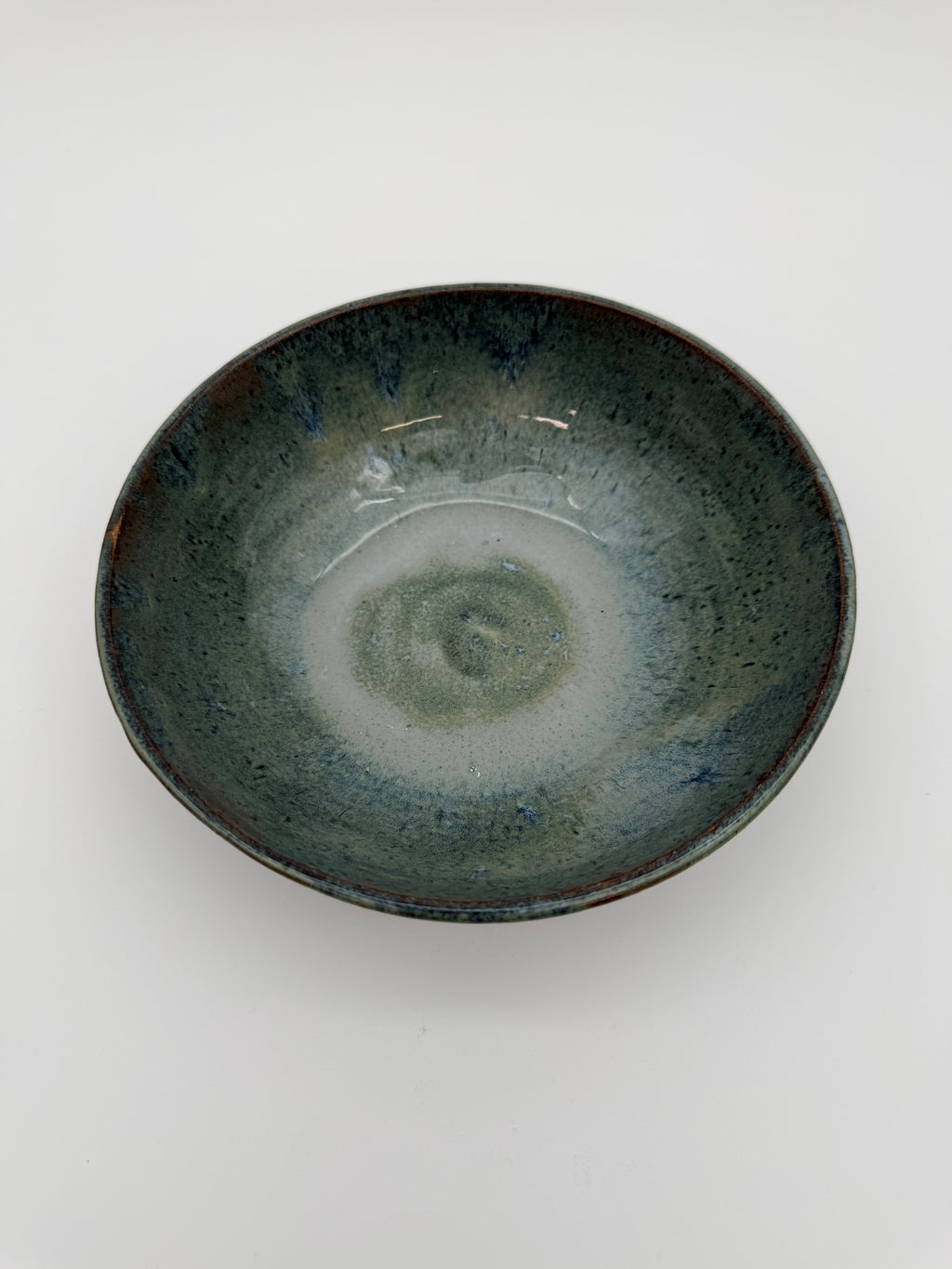 Bowl with blue/green graduated glaze.
