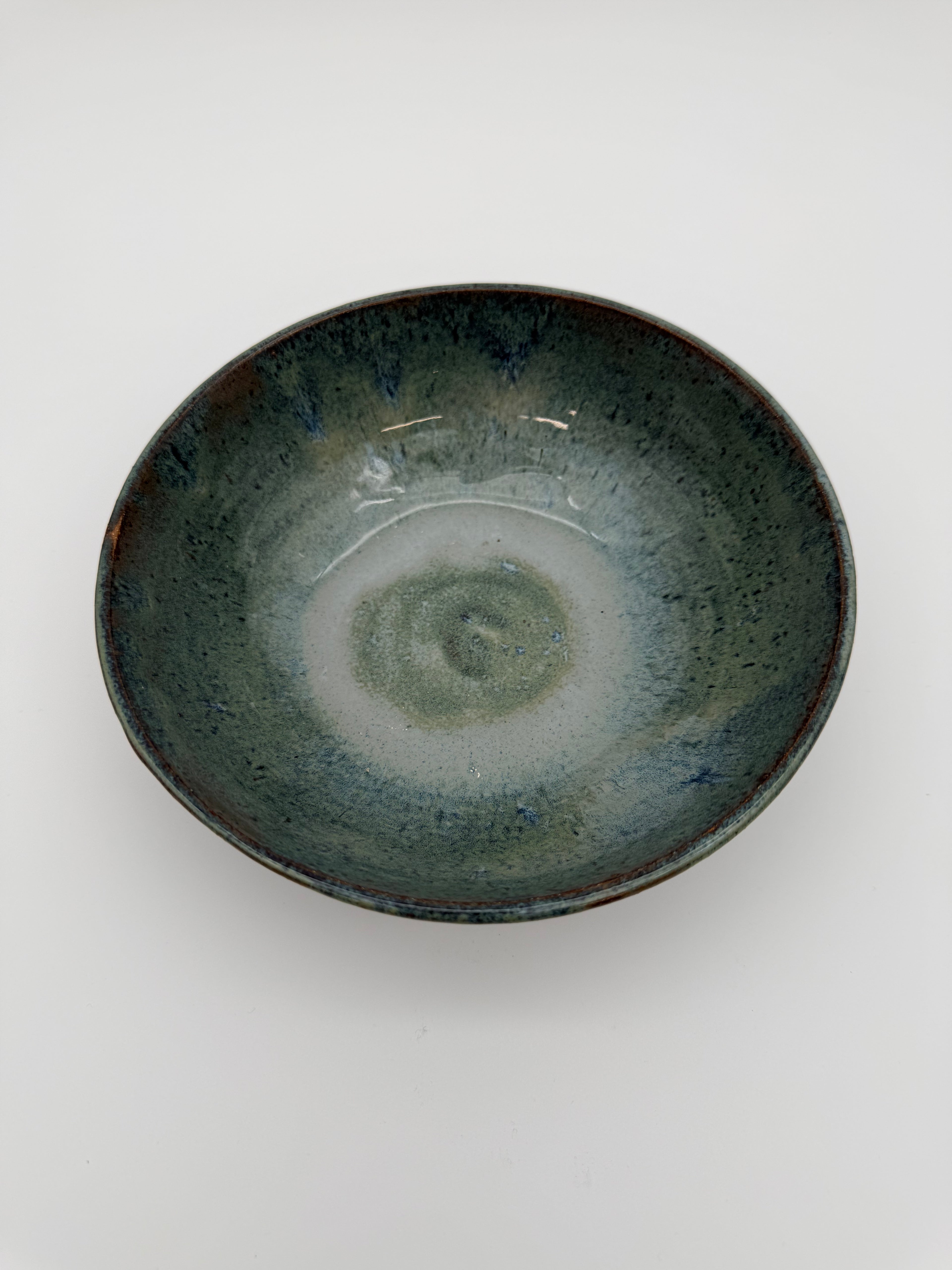 Bowl with blue/green graduated glaze.