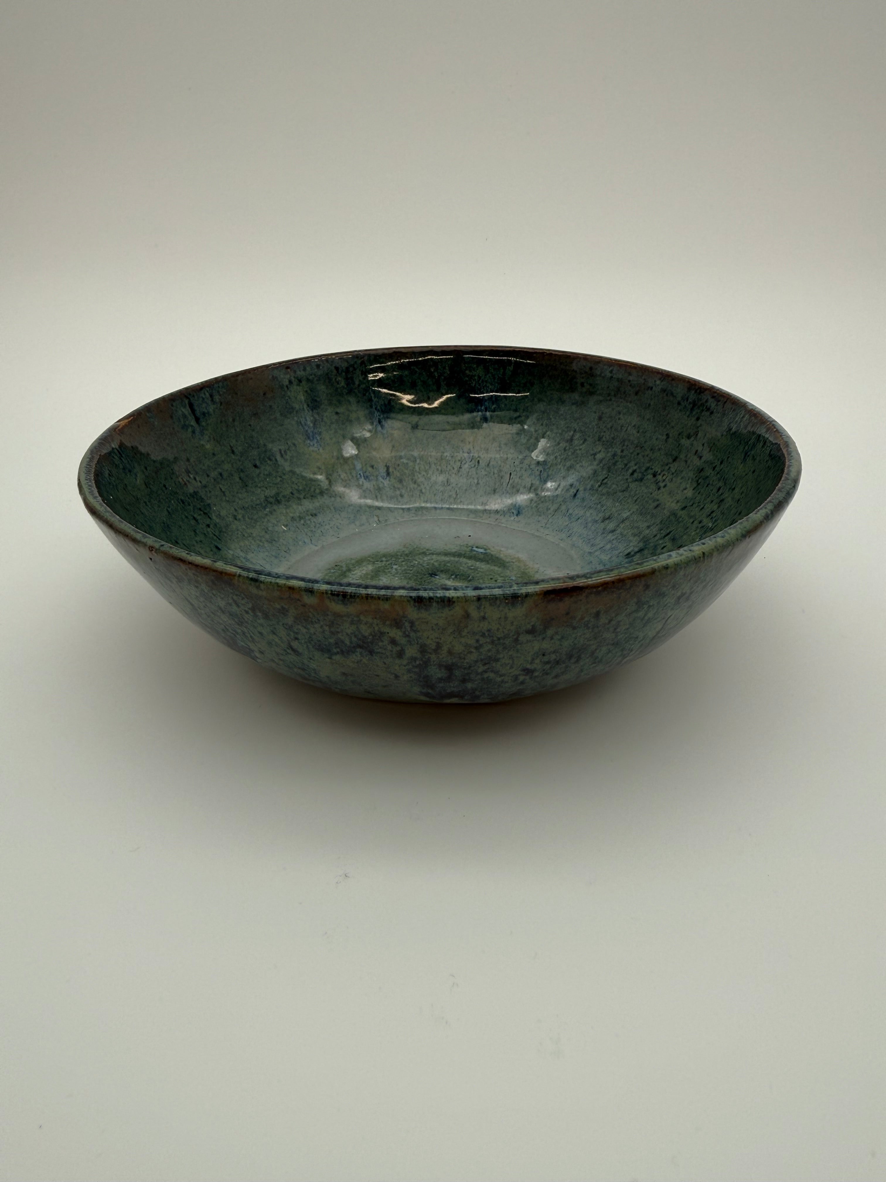 Bowl with blue/green graduated glaze.