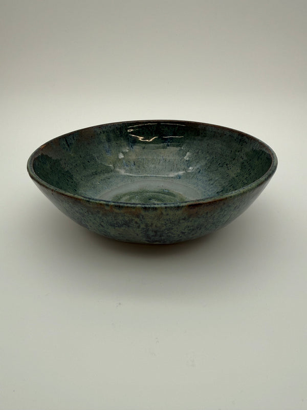 Bowl with blue/green graduated glaze.