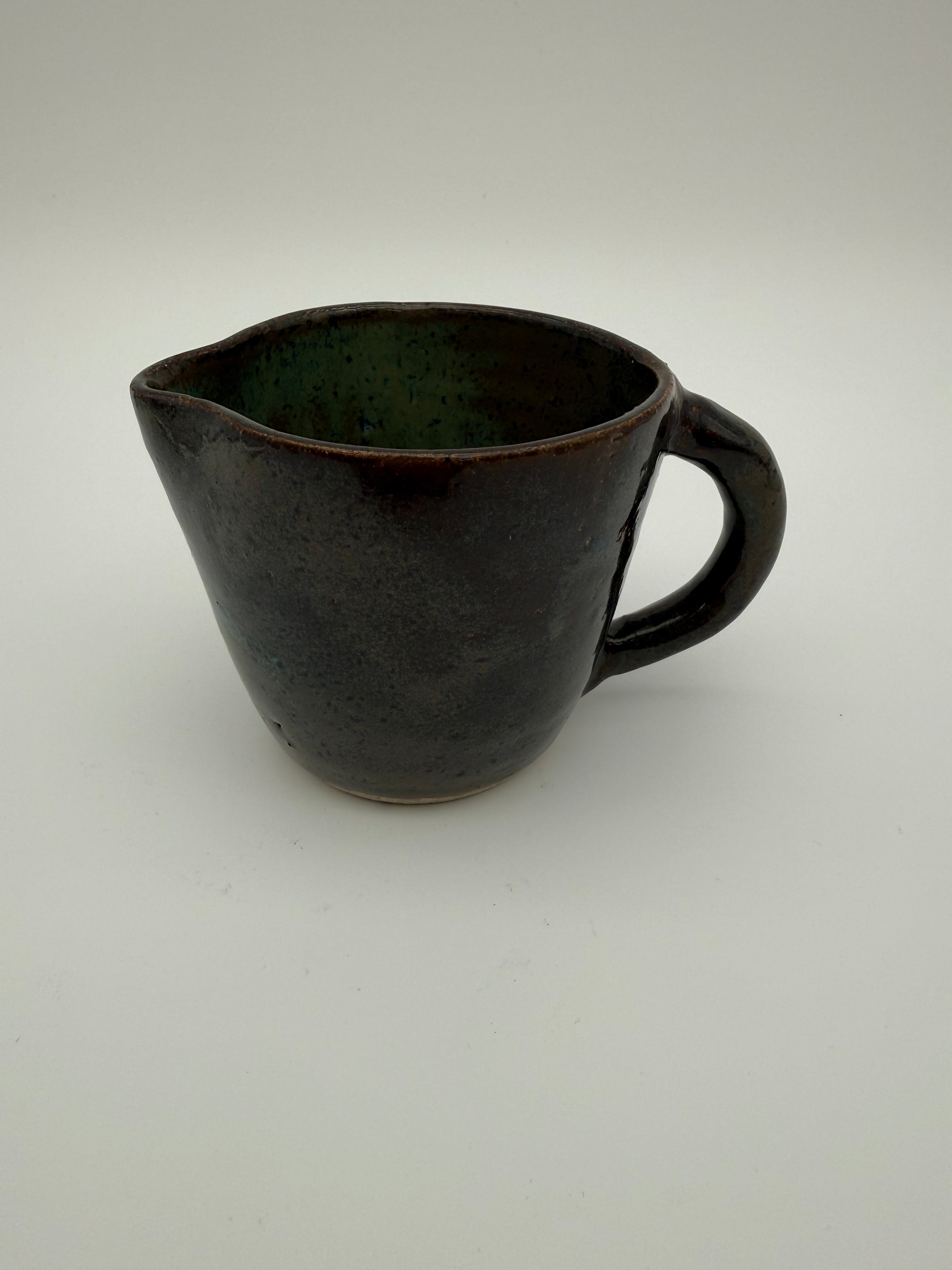 Jug in green/brown glaze