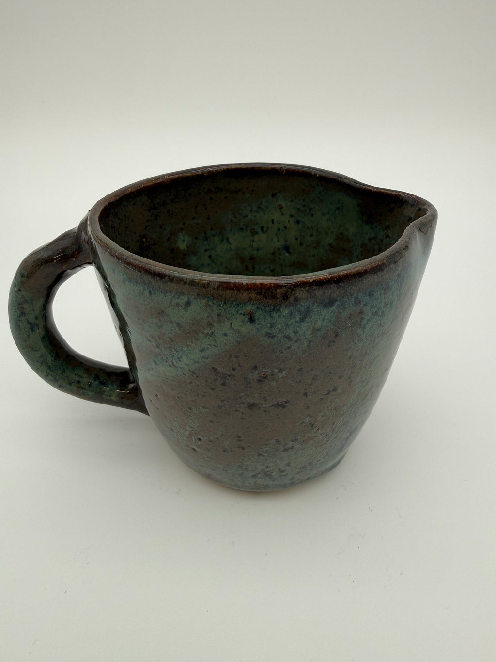 Jug in green/brown glaze