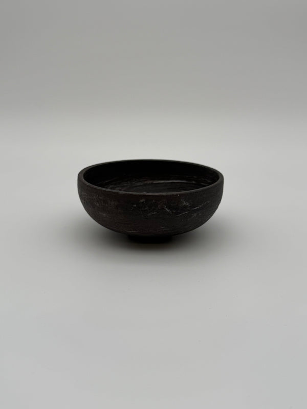 Bowl with matte marbled dark grey finish