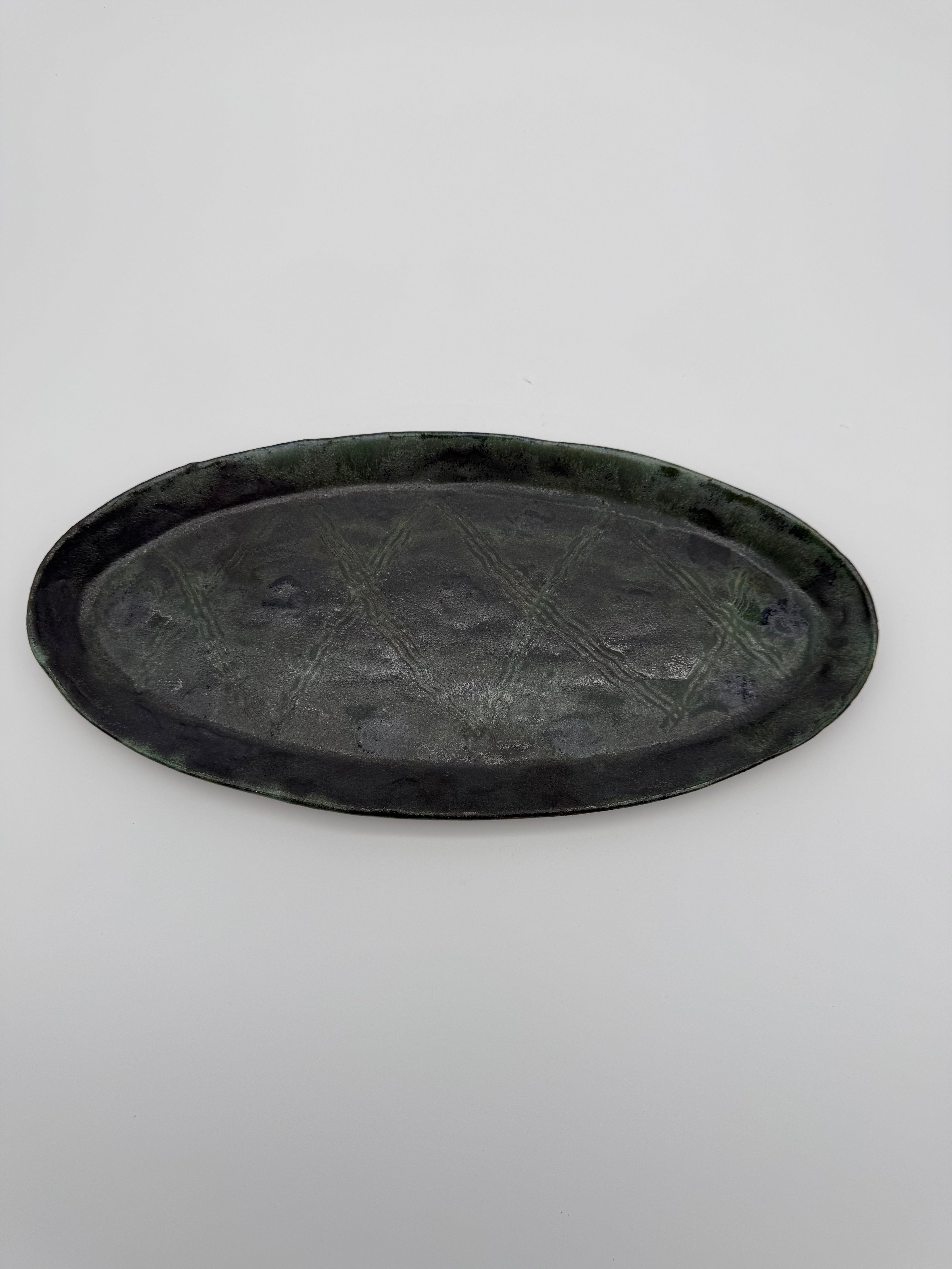 Ceramic platter with imprinted design