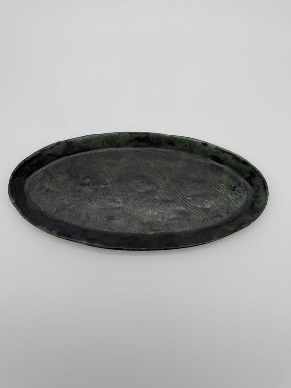 Ceramic platter with imprinted design