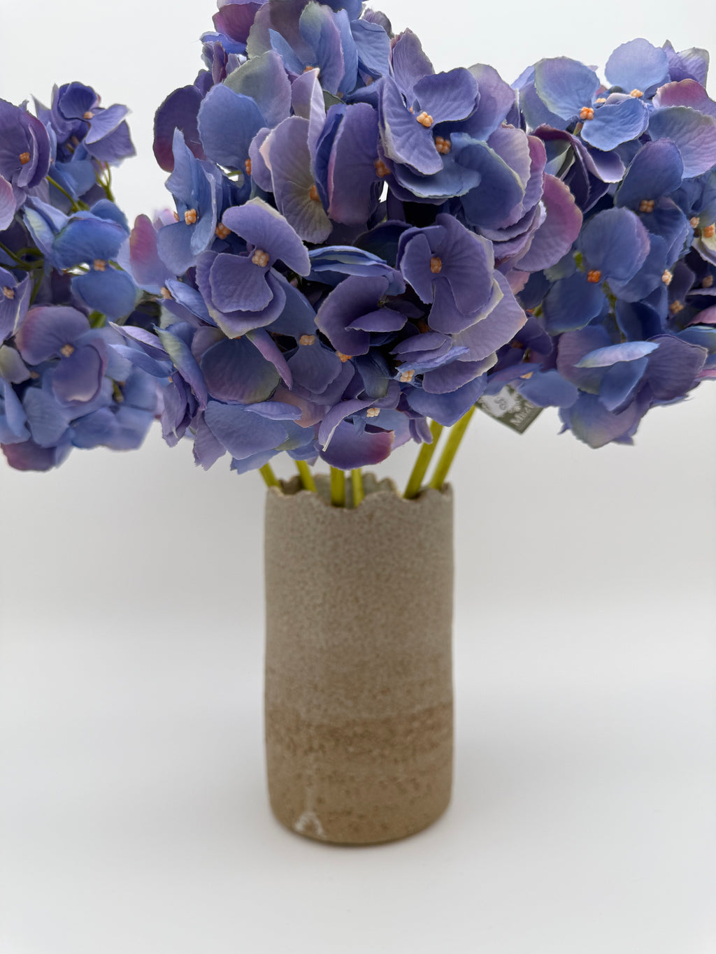 Vase, cylindrical design with hand finished lip