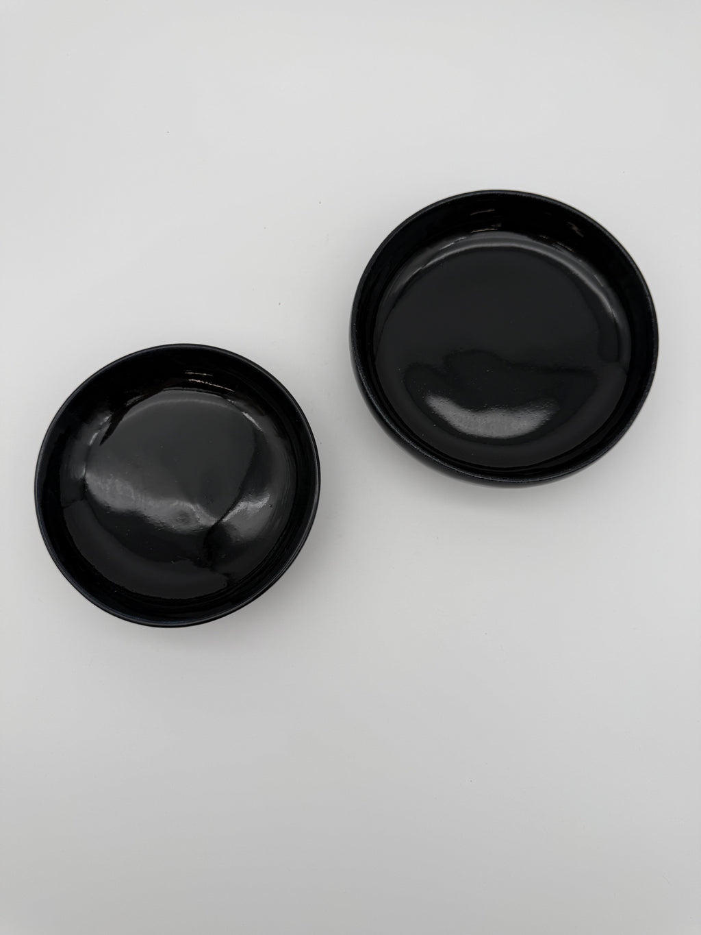 Bowl, black glaze, with small pedestal foot