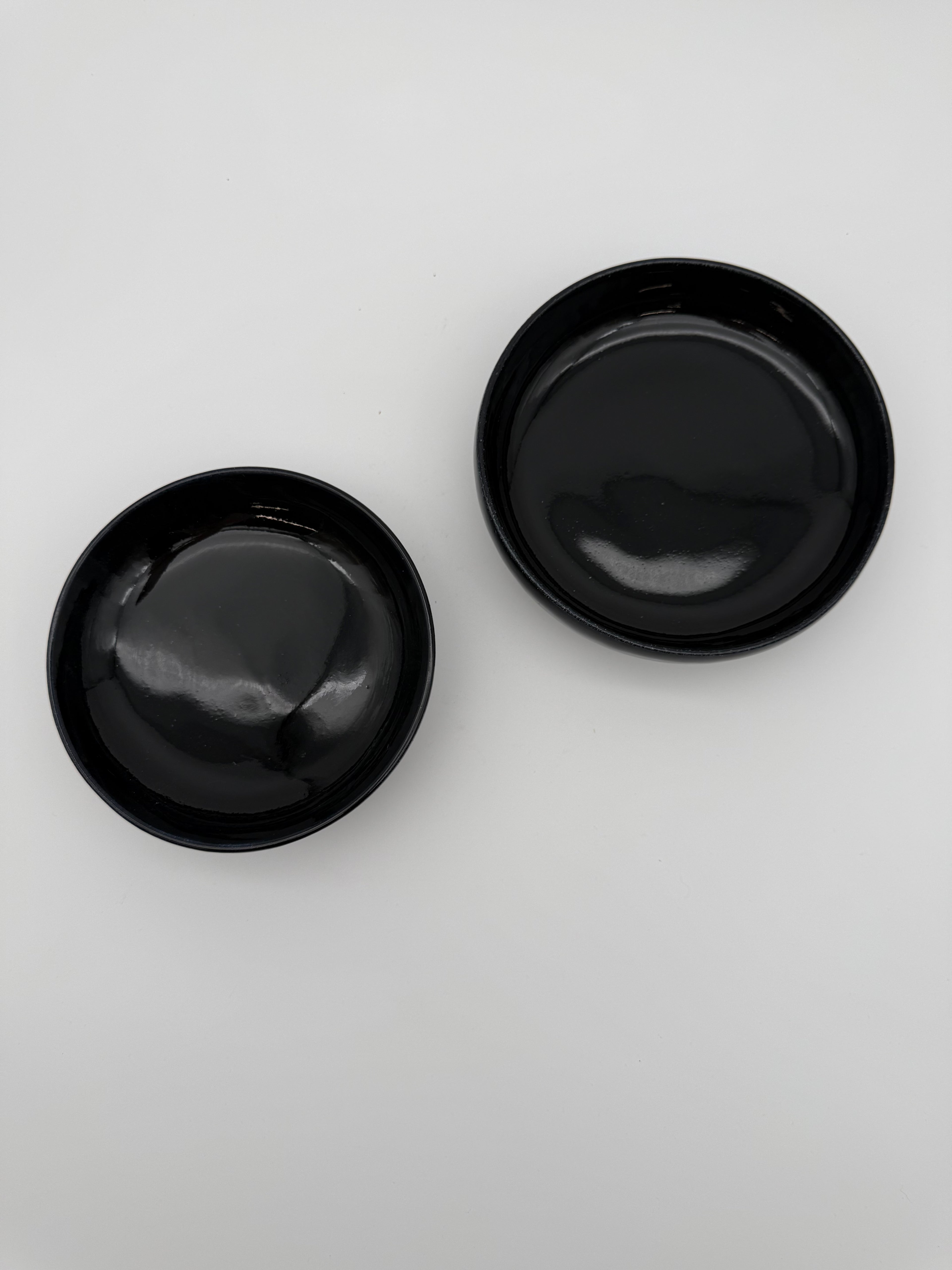 Bowl, black glaze, with small pedestal foot