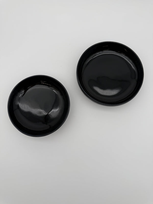 Bowl, black glaze, with small pedestal foot