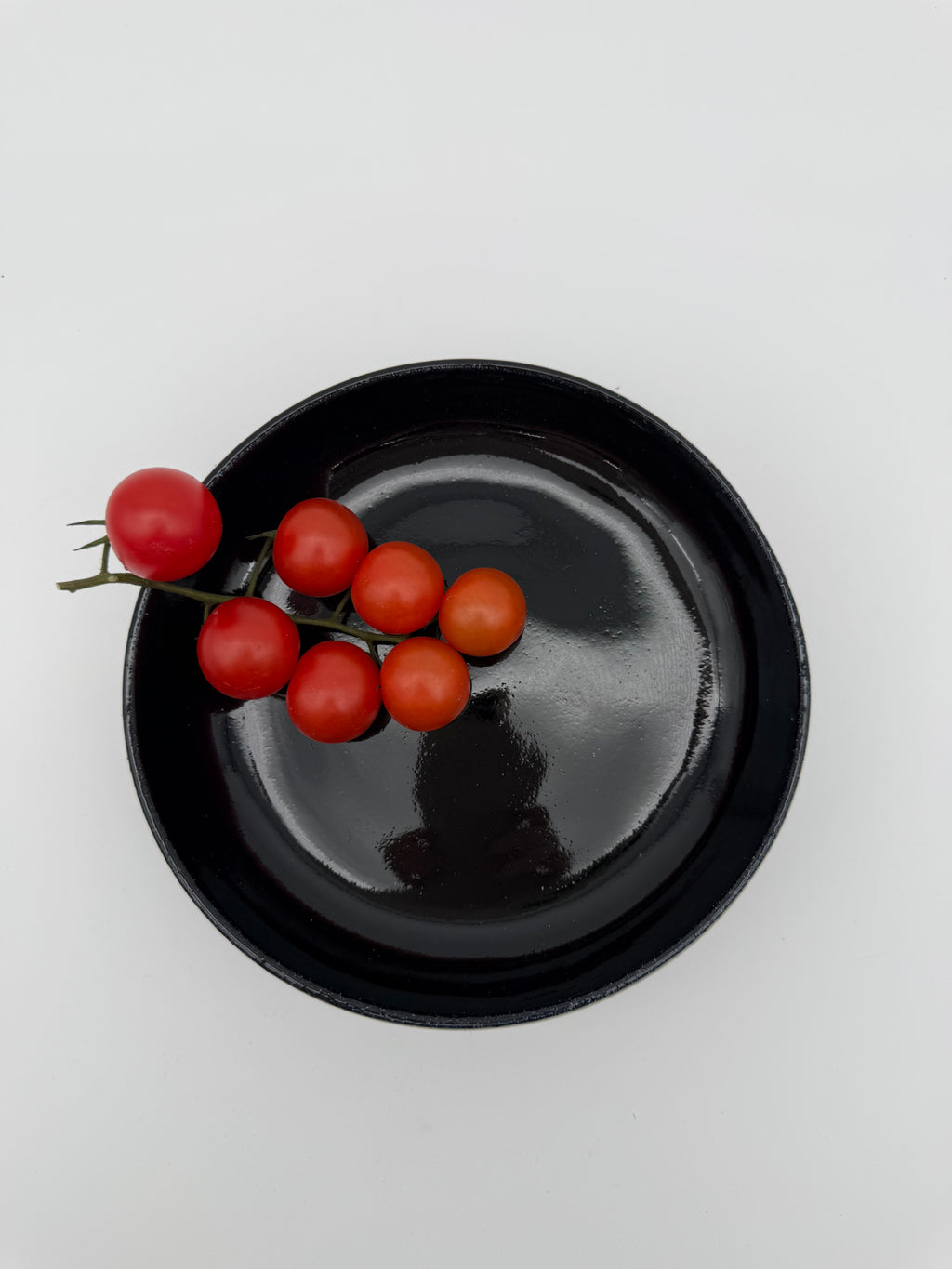 Bowl, black glaze, with small pedestal foot