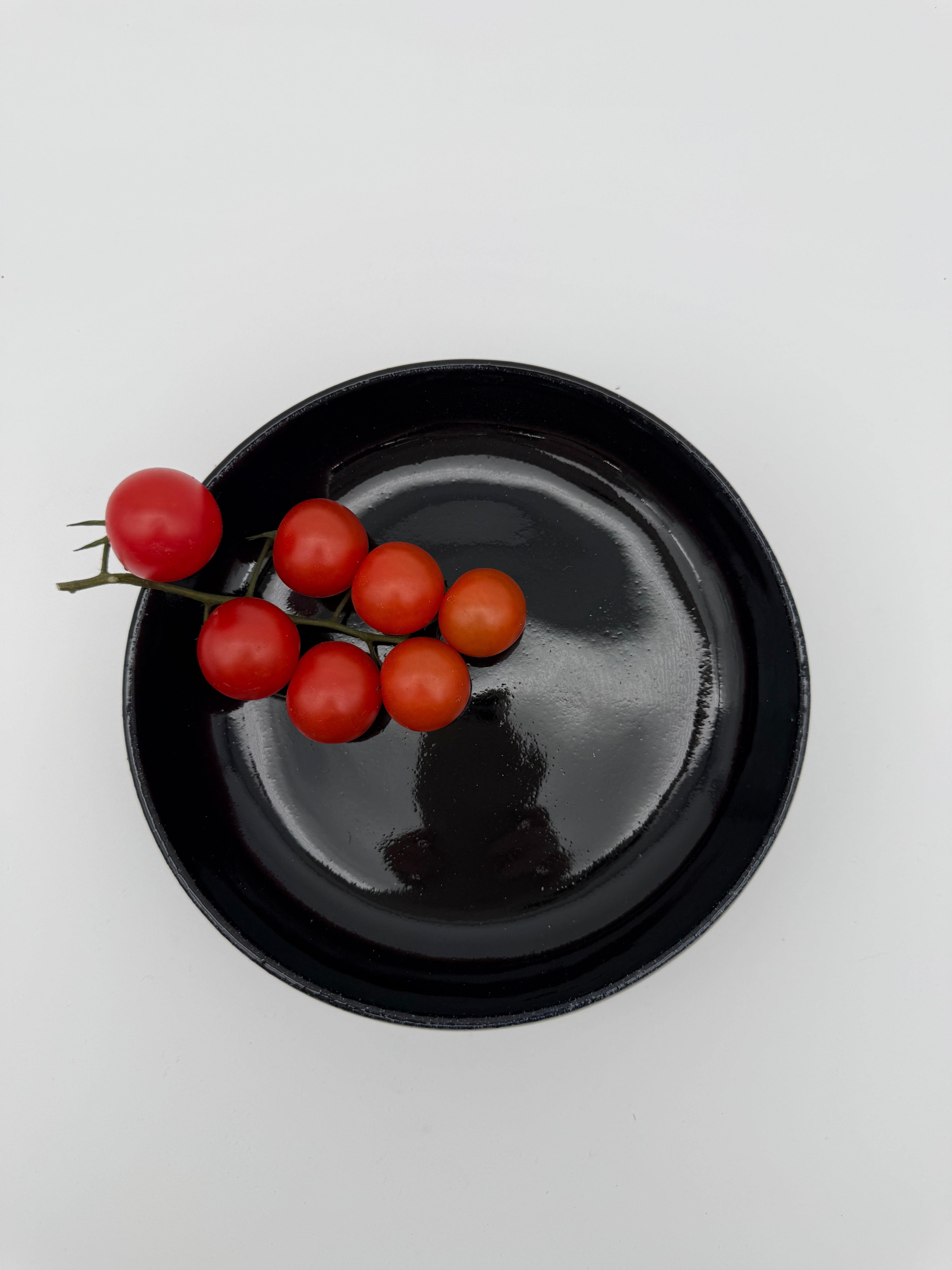 Bowl, black glaze, with small pedestal foot