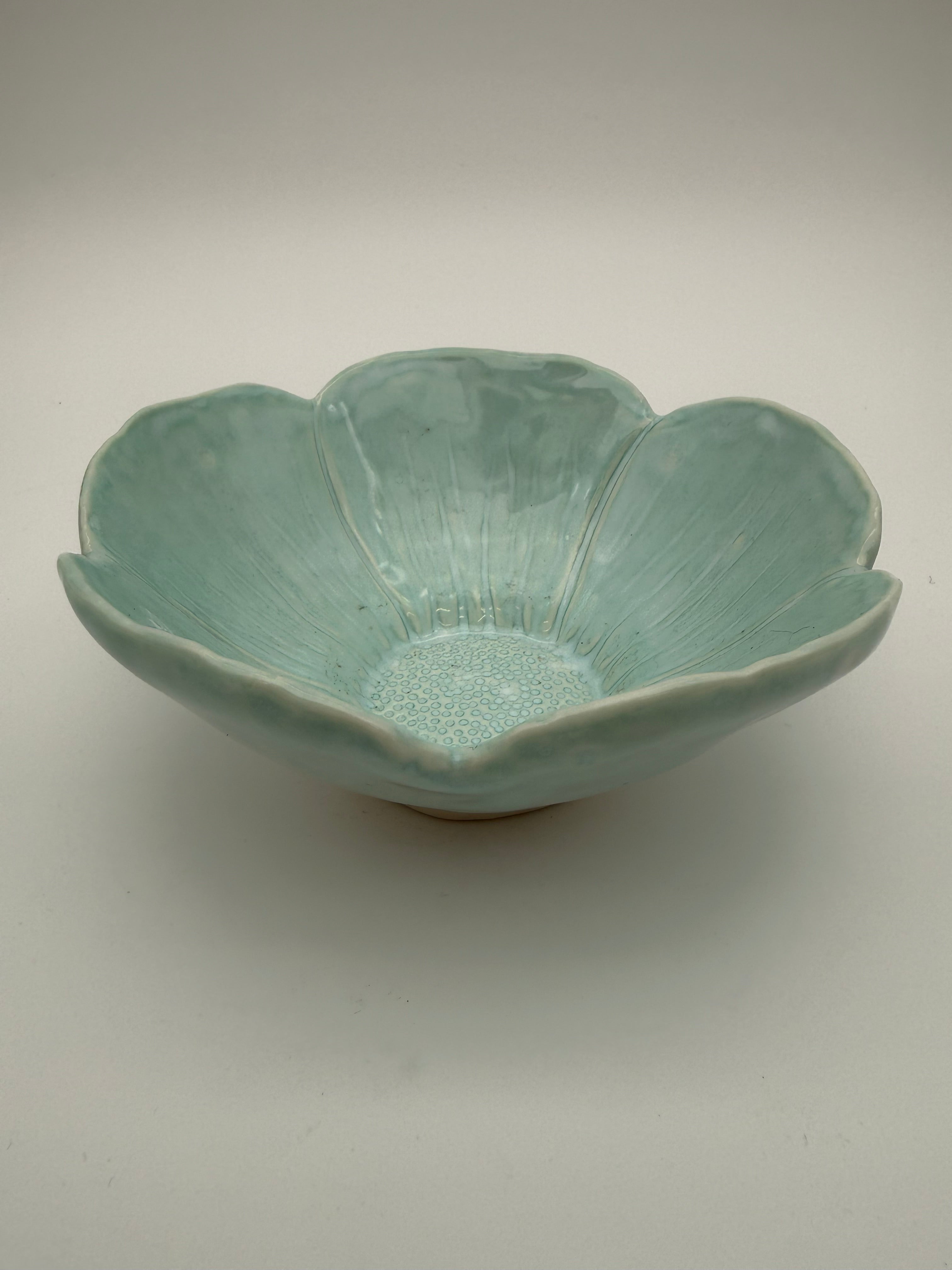 Bowl, petal design, in pale green glaze