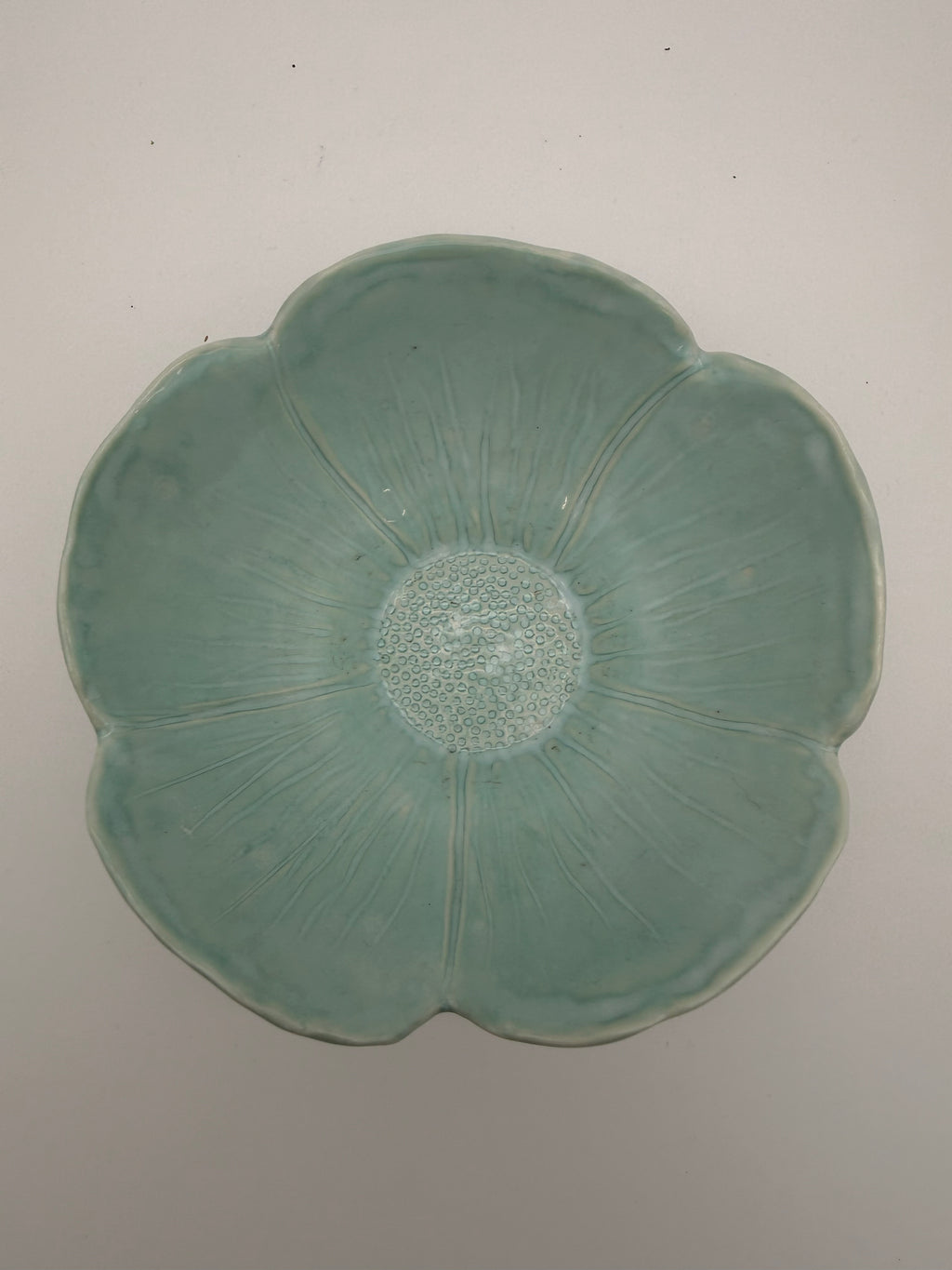 Bowl, petal design, in pale green glaze