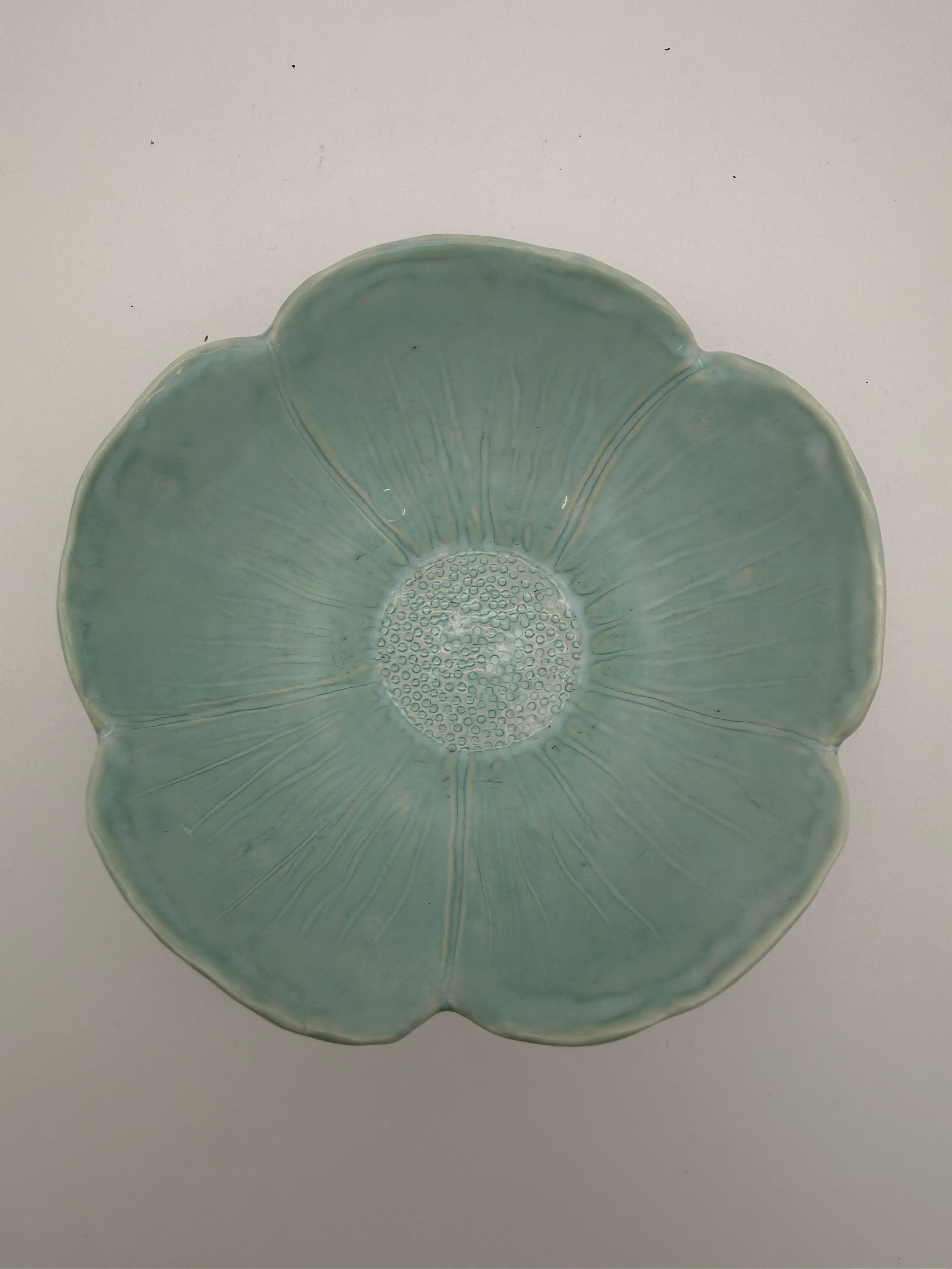 Bowl, petal design, in pale green glaze