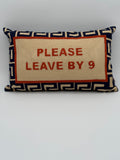 Cushion - "Please Leave By Nine".  Needlepoint.